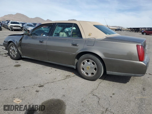 2002 Cadillac DeVille DHS z VIN 1G6KE57Y22U291523, wystawiony jako Copart lot #45711095 z przebiegiem 160 364 mil mil oraz Szkoda całkowita • Salvage title. Historia ofert i sprzedaży dostępna na DreamBid. Obrazek 2.