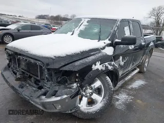 2014 Ram 1500 Big Horn with VIN 1C6RR7LM7ES390604, listed as a IAAI auction lot 41213829 with 212,892 mi miles and . Bid and sale history available at DreamBid. Image 2.