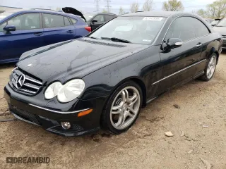 2008 Mercedes-Benz CLK-Class 5.5L with VIN WDBTJ72H08F245331, listed as a Copart auction lot 52142694 with 68,697 mi miles and Salvage Title. Bid and sale history available at carsss.com. Image 1.