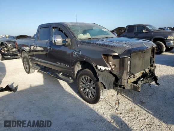 2016 Nissan Titan XD Platinum Reserve with VIN 1N6BA1F25GN506566, listed as a Copart auction lot 74627704 with 87,012 mi miles and Salvage Title. Bid and sale history available at carsss.com. Image 4.