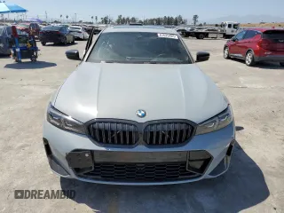 2023 BMW 3 Series 330i with VIN 3MW69FF00P8D52700, listed as a Copart auction lot 61629485 with 12,007 mi miles and Salvage title. Bid and sale history available at DreamBid. Image 5.