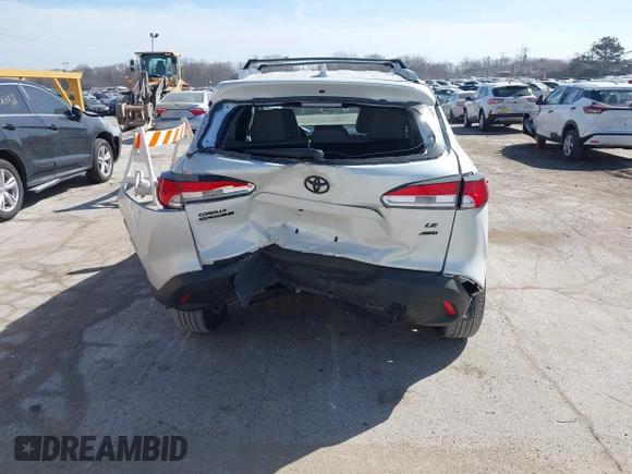 2022 Toyota Corolla Cross LE with VIN 7MUCAABG7NV013235, listed as a IAAI auction lot 41796408 with 20,943 mi miles and . Bid and sale history available at DreamBid. Image 17.