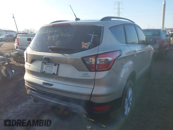 2017 Ford Escape SE with VIN 1FMCU0GD9HUE65306, listed as a IAAI auction lot 41662506 with 69,105 mi miles. Bid and sale history available at carsss.com. Image 4.
