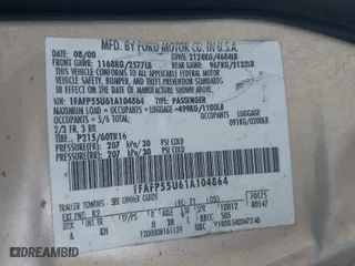 2001 Ford Taurus SES with VIN 1FAFP55U61A104864, listed as a IAAI auction lot 42004016 with 166,694 mi miles. Bid and sale history available at carsss.com. Image 9.