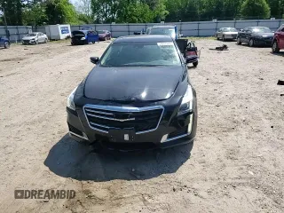 2019 Cadillac CTS Luxury AWD z VIN 1G6AX5SX4K0147273, wystawiony jako Copart lot #54537985 z przebiegiem 58 167 mil mil oraz Szkoda całkowita • Salvage title. Historia ofert i sprzedaży dostępna na DreamBid. Obrazek 13.