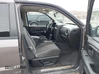 2008 GMC Envoy SLE2 with VIN 1GKDT13S482236375, listed as a IAAI auction lot 41510610 with 183,716 mi miles. Bid and sale history available at carsss.com. Image 5.