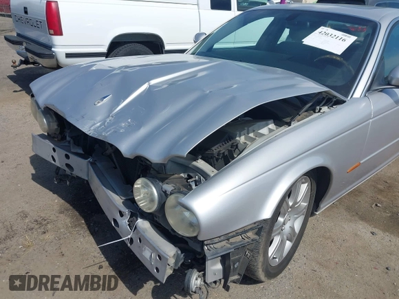 2004 Jaguar XJ 8 with VIN SAJEA71C74SG11470, listed as a IAAI auction lot 42032116 with 209,821 mi miles and . Bid and sale history available at DreamBid. Image 18.
