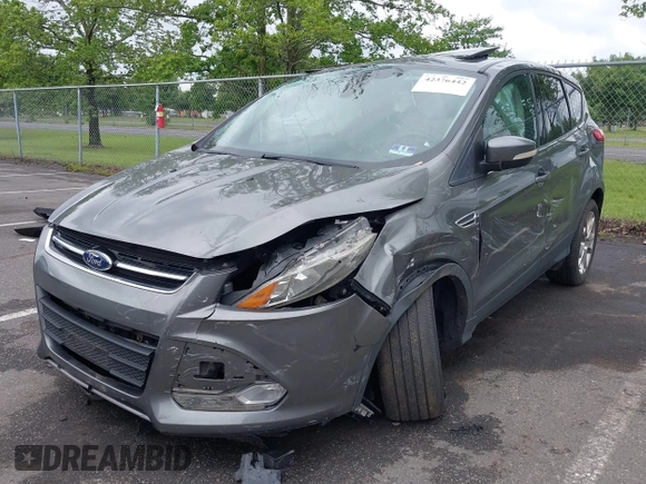 2013 Ford Escape SEL z VIN 1FMCU9H96DUC66206, wystawiony jako IAAI lot #42376442 z przebiegiem 96 776 mil mil oraz . Historia ofert i sprzedaży dostępna na DreamBid. Obrazek 6.
