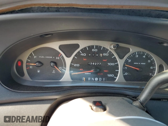 1999 Ford Taurus SE with VIN 1FAFP53U2XG184723, listed as a Copart auction lot 60787115 with 128,277 mi miles and Salvage title. Bid and sale history available at DreamBid. Image 9.