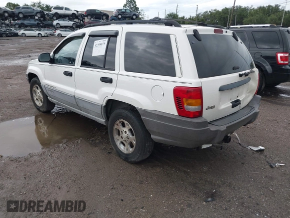 2000 Jeep Grand Cherokee Laredo z VIN 1J4G248S2YC339997, wystawiony jako IAAI lot #42395079 z przebiegiem 261 704 mil mil oraz . Historia ofert i sprzedaży dostępna na DreamBid. Obrazek 3.