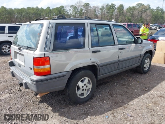 1994 Jeep Grand Cherokee Laredo with VIN 1J4GZ58Y0RC200247, listed as a IAAI auction lot 41781078 with 217,698 mi miles. Bid and sale history available at carsss.com. Image 4.
