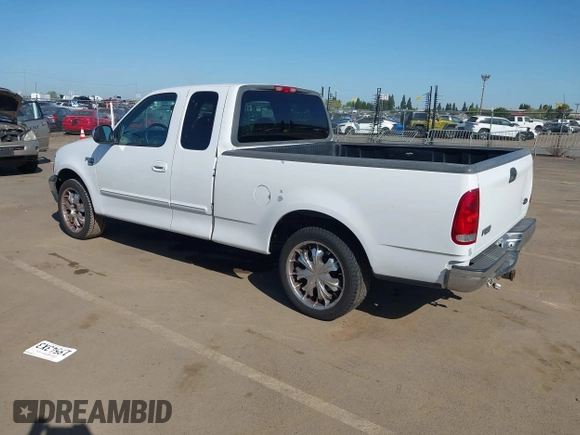 2000 Ford F-150 XL with VIN 1FTRX17LXYKA19714, listed as a IAAI auction lot 41996370 with 0 mi miles. Bid and sale history available at carsss.com. Image 3.