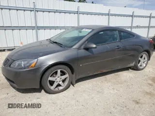 2006 Pontiac G6 GT z VIN 1G2ZH158664179395, wystawiony jako Copart lot #59921085 z przebiegiem 247 768 mil mil oraz Szkoda całkowita • Salvage title. Historia ofert i sprzedaży dostępna na DreamBid. Obrazek 1.