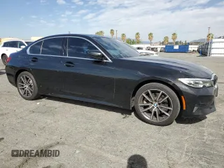 2020 BMW 3 Series 330i with VIN WBA5R1C02LFH42057, listed as a Copart auction lot 47142865 with 200,121 mi miles and Clean Title. Bid and sale history available at carsss.com. Image 4.