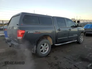 2012 Nissan Titan S with VIN 1N6AA0EC0CN325059, listed as a Copart auction lot 84828374 with 148,856 mi miles and Salvage Title. Bid and sale history available at carsss.com. Image 3.