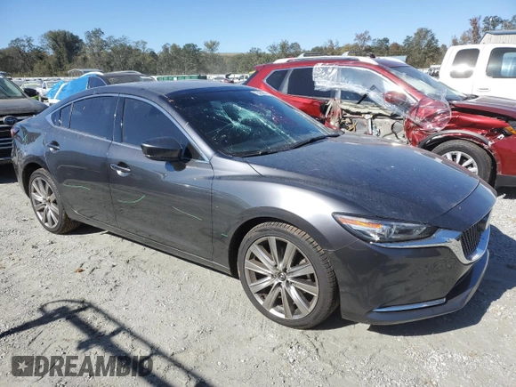 2021 Mazda 6 Signature with VIN JM1GL1XY2M1619514, listed as a Copart auction lot 75494944 with 35,069 mi miles and Salvage Title. Bid and sale history available at DreamBid. Image 4.