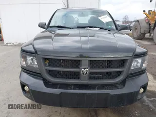 2011 Ram Dakota Bighorn/Lonestar with VIN 1D7RW3GK6BS611095, listed as a IAAI auction lot 41433067 with 137,638 mi miles. Bid and sale history available at carsss.com. Image 12.