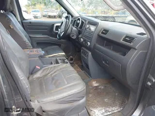 2008 Honda Ridgeline RTL with VIN 2HJYK16548H517715, listed as a IAAI auction lot 41818060 with 239,399 mi miles. Bid and sale history available at carsss.com. Image 5.