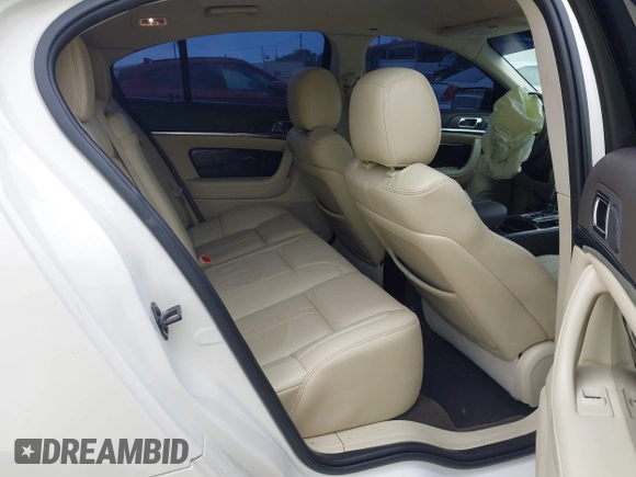 2013 Lincoln MKS with VIN 1LNHL9DKXDG604710, listed as a IAAI auction lot 42001875 with 117,724 mi miles and . Bid and sale history available at DreamBid. Image 8.