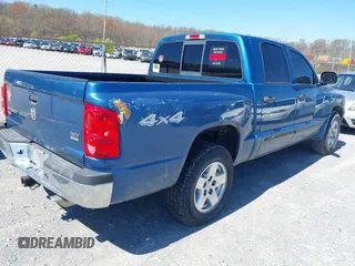 2005 Dodge Dakota SLT with VIN 1D7HW48N05S339156, listed as a IAAI auction lot 41862684 with 158,796 mi miles and . Bid and sale history available at DreamBid. Image 4.