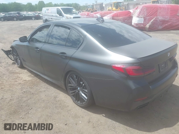 2023 BMW 5 Series M550i xDrive with VIN WBA13BK02PCN47443, listed as a IAAI auction lot 42290388 with Not provided miles and . Bid and sale history available at DreamBid. Image 3.