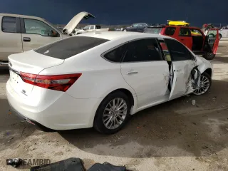 2016 Toyota Avalon Hybrid XLE Premium with VIN 4T1BD1EB5GU055734, listed as a Copart auction lot 36769403 with 84,639 mi miles. Bid and sale history available at carsss.com. Image 3.