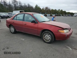 1997 Ford Escort LX with VIN 1FALP13P3VW311987, listed as a Copart auction lot 73134154 with 68,304 mi miles and Clean Title. Bid and sale history available at carsss.com. Image 4.
