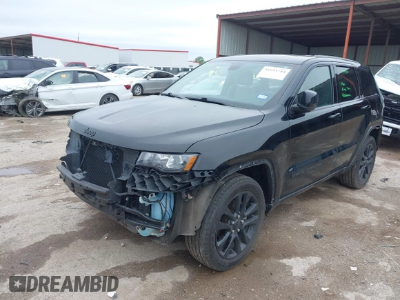 2018 Jeep Grand Cherokee Laredo E with VIN 1C4RJFAG5JC280033, listed as a IAAI auction lot 41953744 with 69,269 mi miles and . Bid and sale history available at DreamBid. Image 18.