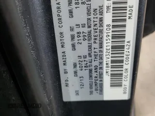 2014 Mazda 3 S Touring with VIN JM1BM1V32E1159108, listed as a Copart auction lot 45466845 with 96,744 mi miles and Salvage Title. Bid and sale history available at DreamBid. Image 14.