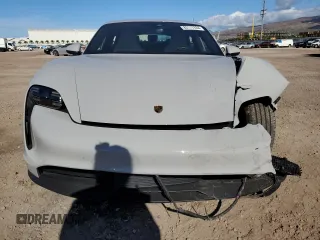 2024 Porsche Taycan z VIN WP0AA2Y17RSA10152, wystawiony jako Copart lot #83117234 z przebiegiem Nie podano mil oraz Szkody całkowita. Historia ofert i sprzedaży dostępna na DreamBid. Obrazek 5.