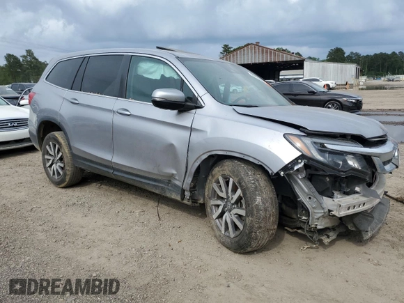 2021 Honda Pilot EX-L with VIN 5FNYF5H54MB018989, listed as a Copart auction lot 55721405 with 121,359 mi miles and Salvage Title. Bid and sale history available at carsss.com. Image 4.