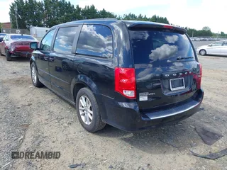 2013 Dodge Grand Caravan SXT with VIN 2C4RDGCG9DR563072, listed as a IAAI auction lot 42179166 with 211,008 mi miles and . Bid and sale history available at DreamBid. Image 3.