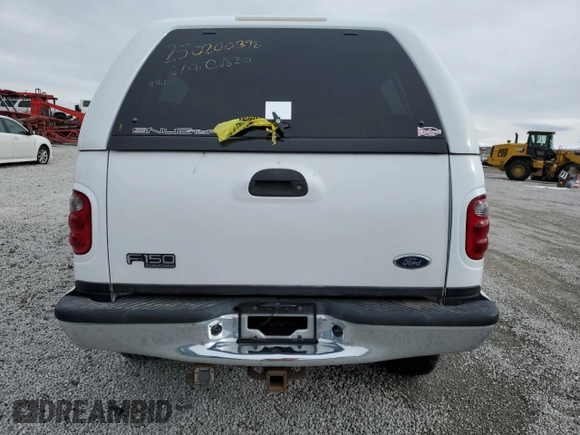 2002 Ford F-150 XLT with VIN 1FTRW08L32KA76808, listed as a Copart auction lot 45020845 with 165,599 mi miles and Salvage Title. Bid and sale history available at carsss.com. Image 6.