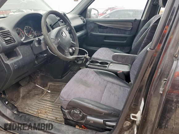 2002 Honda CR-V LX z VIN JHLRD68472C024693, wystawiony jako Copart lot #57076495 z przebiegiem 294 743 mil mil oraz Czysty tytuł • Clean title. Historia ofert i sprzedaży dostępna na DreamBid. Obrazek 7.