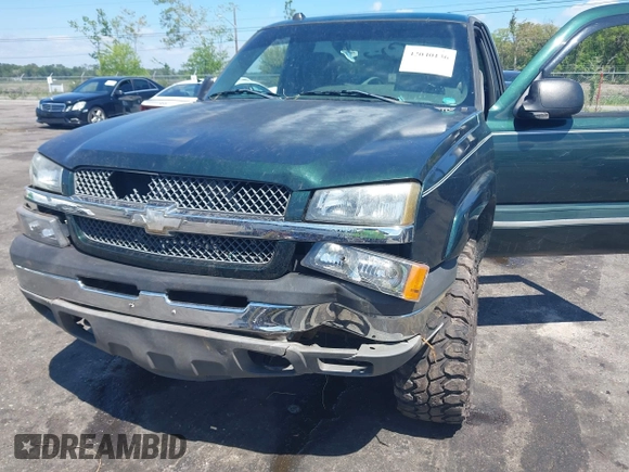 2004 Chevrolet Silverado 1500 Z71 with VIN 1GCEK14T04Z325260, listed as a IAAI auction lot 42040136 with 129,346 mi miles. Bid and sale history available at carsss.com. Image 6.