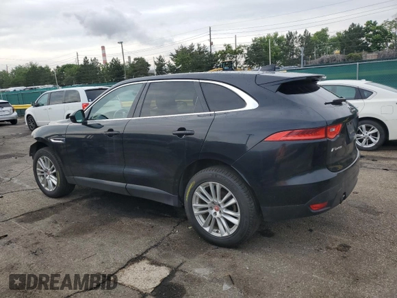 2019 Jaguar F-Pace 25t Prestige with VIN SADCK2GX3KA392592, listed as a Copart auction lot 59199455 with 170,635 mi miles and Salvage title. Bid and sale history available at DreamBid. Image 2.