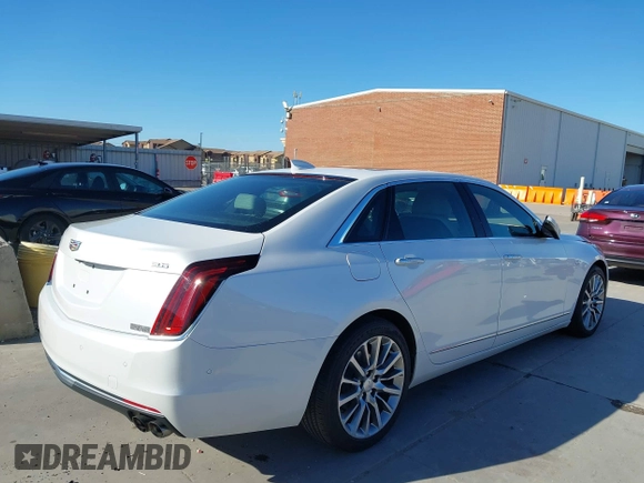 2018 Cadillac CT6 Luxury AWD z VIN 1G6KD5RS9JU151575, wystawiony jako IAAI lot #42078361 z przebiegiem 28 187 mil mil oraz . Historia ofert i sprzedaży dostępna na DreamBid. Obrazek 4.