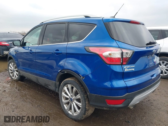 2017 Ford Escape Titanium with VIN 1FMCU9JD8HUA59000, listed as a IAAI auction lot 41559788 with 90,319 mi miles. Bid and sale history available at carsss.com. Image 3.