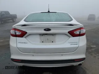 2013 Ford Fusion Titanium Hybrid with VIN 3FA6P0RU9DR371620, listed as a Copart auction lot 83109754 with 176,770 mi miles and Salvage Title. Bid and sale history available at carsss.com. Image 6.