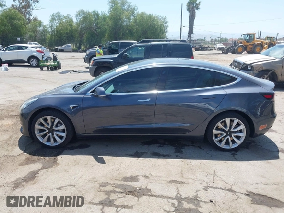 2020 Tesla Model 3 Standard Range Plus with VIN 5YJ3E1EAXLF615781, listed as a IAAI auction lot 42068935 with 96,026 mi miles. Bid and sale history available at carsss.com. Image 14.