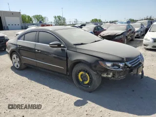2014 Volkswagen CC Sport with VIN WVWBN7AN6EE529590, listed as a Copart auction lot 88780515 with 123,392 mi miles and Salvage Title. Bid and sale history available at DreamBid. Image 4.