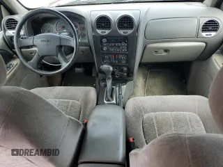 2003 GMC Envoy SLE z VIN 1GKDT13S432160651, wystawiony jako Copart lot #56938205 z przebiegiem 197 593 mil mil oraz Szkoda całkowita • Salvage title. Historia ofert i sprzedaży dostępna na DreamBid. Obrazek 8.
