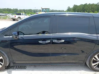 2018 Honda Odyssey Elite z VIN 5FNRL6H91JB109378, wystawiony jako IAAI lot #42270766 z przebiegiem 156 873 mil mil oraz . Historia ofert i sprzedaży dostępna na DreamBid. Obrazek 14.