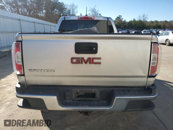 2015 GMC Canyon 2WD with VIN 1GTG5AE38F1156671, listed as a Copart auction lot 85194924 with 123,597 mi miles and Salvage Title. Bid and sale history available at DreamBid. Image 6.