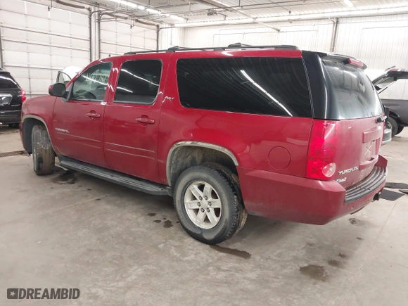 2013 GMC Yukon XL SLT with VIN 1GKS2KE75DR333420, listed as a IAAI auction lot 41712106 with 234,473 mi miles. Bid and sale history available at carsss.com. Image 3.