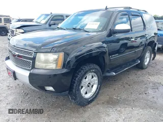 2007 Chevrolet Tahoe LT z VIN 1GNFK13097R388333, wystawiony jako IAAI lot #41948201 z przebiegiem 253 972 mil mil oraz . Historia ofert i sprzedaży dostępna na DreamBid. Obrazek 2.
