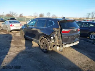 2017 Honda CR-V Touring with VIN 2HKRW2H90HH647274, listed as a IAAI auction lot 41572666 with 95,264 mi miles. Bid and sale history available at carsss.com. Image 3.