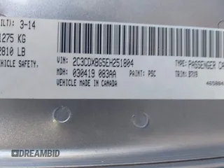 2014 Dodge Charger SE with VIN 2C3CDXBG5EH251804, listed as a IAAI auction lot 41659780 with 207,956 mi miles. Bid and sale history available at carsss.com. Image 9.