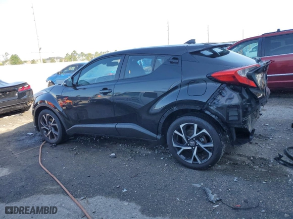 2018 Toyota C-HR XLE with VIN NMTKHMBX0JR022189, listed as a Copart auction lot 52457155 with 97,506 mi miles and Salvage Title. Bid and sale history available at carsss.com. Image 2.