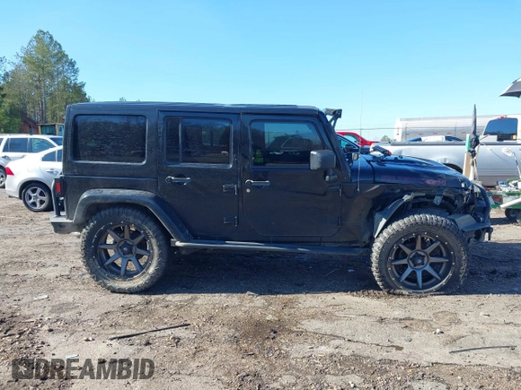2015 Jeep Wrangler Unlimited Rubicon with VIN 1C4BJWFG9FL755152, listed as a IAAI auction lot 41293766 with 109,153 mi miles. Bid and sale history available at carsss.com. Image 14.